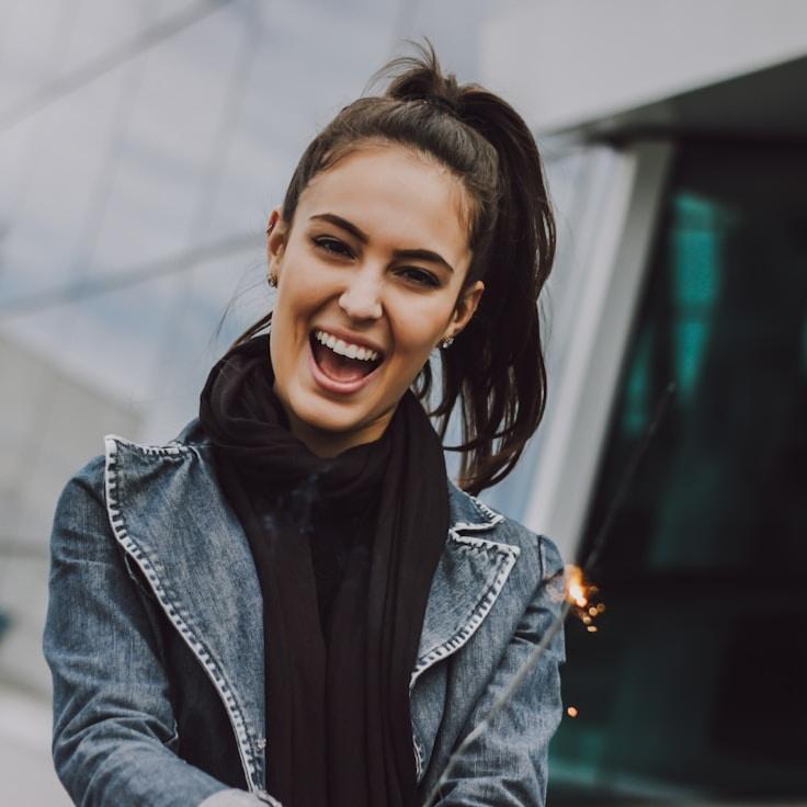 Avery Chen, Lead Design Curator at Horizon Link Hub, reviewing corporate floral arrangements